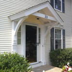 Cedar Bracket 10T11 — installed on garage overhang | Timber Build