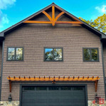 Cedar Gable Bracket 41T72 — above garage close-up | Timber Build