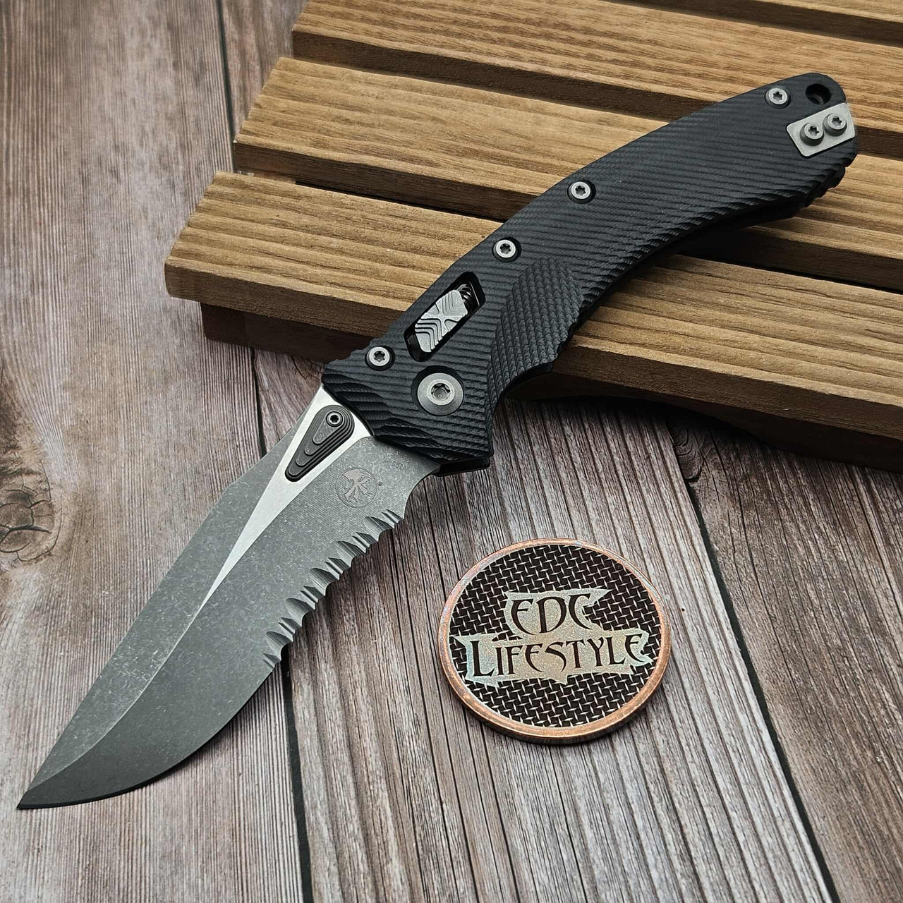 Microtech Amphibian Ram-Lok S/E Fluted Black G-10 Partial Serrated