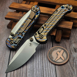 Microtech LUDT Ram-Lok Manual Flamed Grooved Titanium 3.4" Clip Point Stonewash M390MK Blue Ti Accent Marfione Select 1135RLG-10MS4