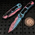 Heretic Wraith V4 Auto knife with Cotton Candy Cel Shading finish and UV-reactive pink and blue hand-painted Cerakote from EDC Lifestyle in Dallas-Fort Worth Texas