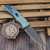 Pro-Tech Knives 2026 Duke Custom 005 Seafoam Green Titanium Handle Abalone Inlay & Button 2.7" Chad Nichols Raindrop Damascus Blade Anodized Ti Clip Satin HW