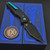 Chaves Jake McCoy Omega Street Black Knurled Aluminum 154CM Black PVD Green Ti HW