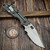 Strider XL Titanium DGG 4.38" Magnacut - Preowned