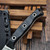 Microtech Akris Fixed Blade Black G-10 3.7" Stonewash M390MK W/ Black Kydex Sheath 95-10BK-5