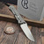 Chris Reeve Knives CRK Umnumzaan Titanium Drop Point Glass Blasted Magnacut UMN-1012 - Preowned TG