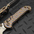 Microtech LUDT Ram-Lok Manual Flamed Frag Titanium 3.4" T/E Stonewash M390MK Bronze Ti Accent Marfione Select 1136RL-10FRMS3