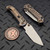 Microtech LUDT Ram-Lok Manual Flamed Grooved Titanium 3.4" Tanto Stonewash M390MK Blue Ti Accent Marfione Select 1136RLG-10MS4
