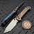 Microtech LUDT Ram-Lok Manual Flamed Slab Side Titanium 3.4" Tanto Stonewash M390MK Blue Ti Accent Marfione Select 1136RLS-10MS4