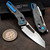 Dew Hara SOUGA Marble Carbon Fiber Crossbar Lock Mirror Polish 3.63" M390 Reverse Tanto