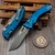 Microtech Amphibian Mini Ram-Lok Blue Aluminum Frag 3.25" S/E Apocalyptic 137MRL-10APFRBL by EDC Lifestyle