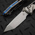 MICROTECH SOCOM RAM-LOK T/E STONEWASH TITANIUM TEXTURED INLAY W/BLUE TI ACCENT MARFIONE SELECT 161RL-10MS3