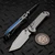 Microtech LUDT Ram-Lok Manual Stonewash Grooved Titanium 3.4" Tanto Stonewash M390MK Blue Ti Accent Marfione Select 1136RLG-10MS2 by EDC Lifestyle