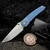 Sharknivco PJ Waka Blue Barked Titanium Handle Frame Lock RWL34 Hand Satin Blade