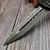 Microtech Combat Troodon Frag OFF Grenade Green W/ Grenade Lanyard 4" D/E Apocalyptic Double Reverse Full Serrated 142-DR12APFOGG