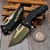Heretic Martyr Manual Black Button Lock Flipper with 3.5" T/E Tanto Edge Bronze blade available at EDC Lifestyle  H057-7A
