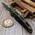 Microtech Socom Elite Manual Distressed Grenade Green 4" T/E Apocalyptic Full Serrated 161-12DGG-U25