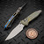 Microtech Socom Ram-Lok Galatic Gold Slab Side Titanium w/Blue TI Accent 4.00" Clip Point Stonewash Marfione Select 160RLS-10MS12 By Edc Lifestyle