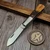 New York Knife Co. M1506 AB SC Amber Bone Sawcut Folding Knife - Preowned