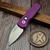 Pro-Tech Runt 5 Battleworn Purple Satin Magancut Wharncliffe, MOP Button Blade Show West 2025 - Preowned