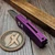 Pro-Tech Runt 5 Battleworn Purple Satin Magancut Wharncliffe, MOP Button Blade Show West 2025 - Preowned