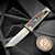 Reate Knives Exo-M Gravity Knife Mult-Color G-10 Damascus Pattern 6AL4V Titanium Bead Blast Handle, ELMAX Satin Tanto 3.125" Blade w/Satin Flats