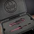 Chris Reeve Knives Large Sebenza 31 Inlay Matte Black DLC / Black Diamond Richlite / Black Cherry Cerakote / Double Lug / MM Clip / Black Lanyard w/Bead Magnacut CRK-L31-1506-002