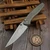 Pro-Tech 2026 Custom 001 Avalon Knurled 17-4 Steel Handle Mike Irie 4.25" Mirror Polished 154CM Compound Grind Blade Show West 2026