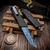 Marfione Custom/Sean Marfione Combat Troodon Gen 2 Blued Vines & Roses Vegas Forge Damascus Rose Whip Tanto Blued Carbon Fiber Top Blued Damascus Pocket Clip w/Blue Ti HW
