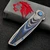 Holt Bladeworks Outlaw OP 218 Flux Fordite Inlays Damasteel