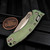 Microtech Amphibian Ram-Lok 137RL-14MS1 Antique Green Titanium Slab Side Partial Serrated Bronze Blade & Ti Accent Marfione Select