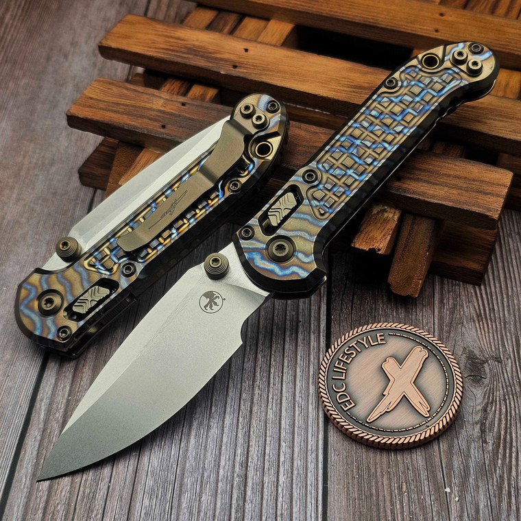 Microtech LUDT Ram-Lok Manual Flamed Frag Titanium 3.4" Clip Point Stonewash M390MK Bronze Ti Accent Marfione Select 1135RL-10FRMS3