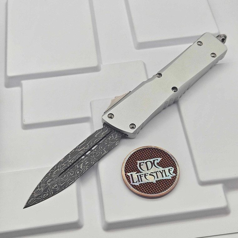 Microtech Combat Troodon 142-16LPCRS Signature Series Clear Smooth Chassis Damascus Standard Low Polished Hardware