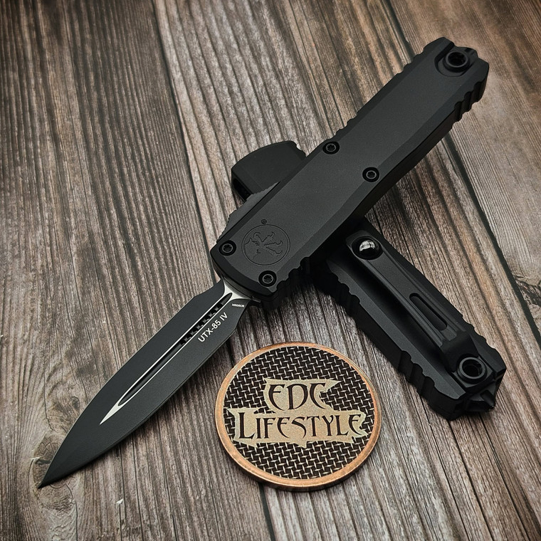 Front view of Microtech UTX-85 Gen IV Black Tactical with 3.10 inch M390MK double edge apocalyptic blade, model 12324-1T.