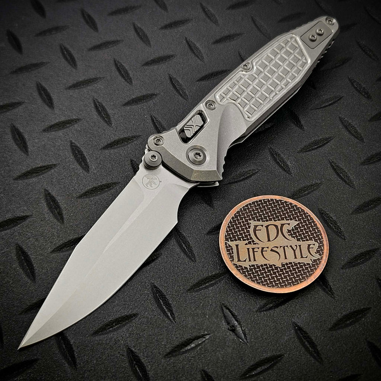 MICROTECH SOCOM RAM-LOK SPEAR POINT STONEWASH FRAG PATTERN TITANIUM W/BLUE TI ACCENT 160RL-10FRSMS1