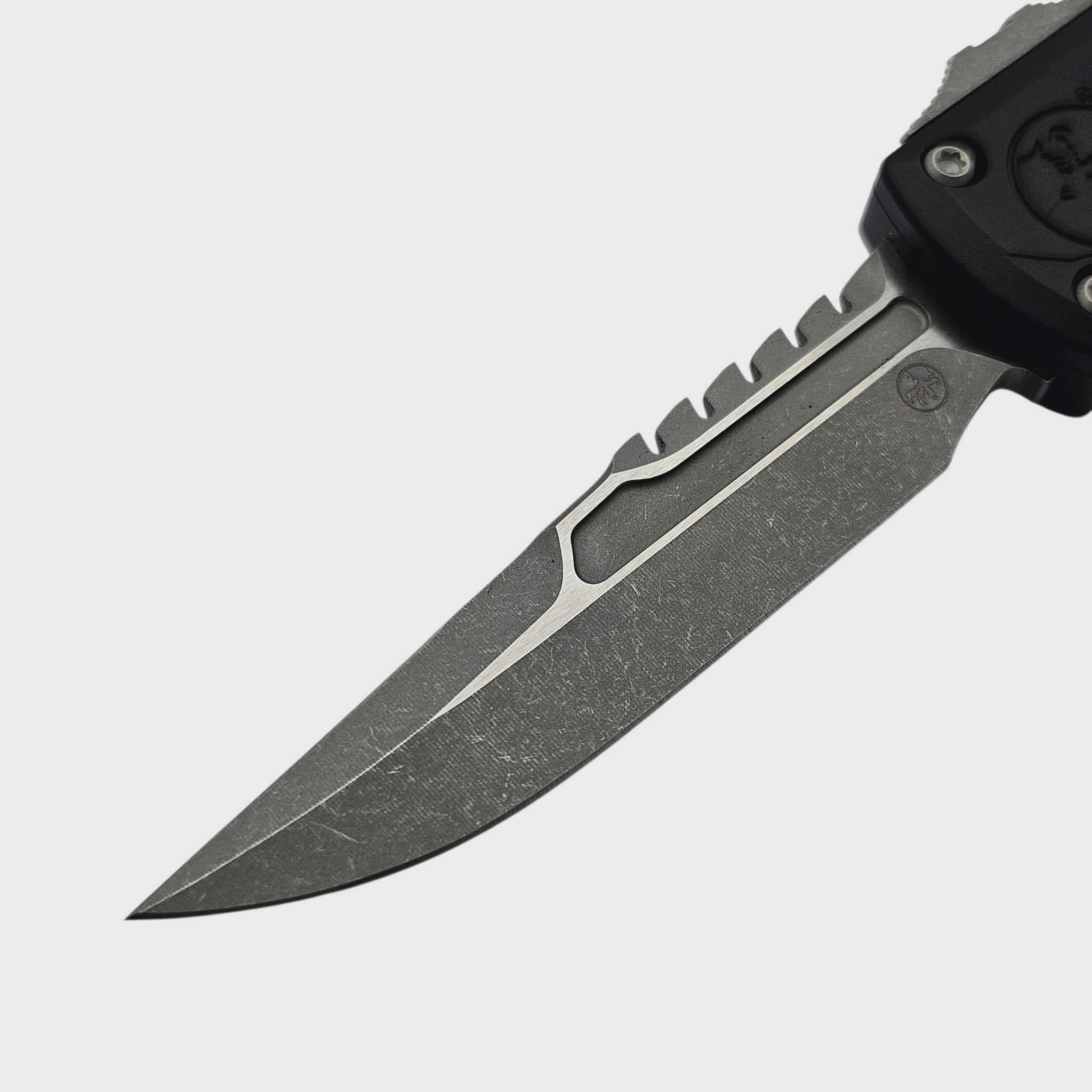 Microtech UTX-85 Gen IV Black Topographic Deep Engraved 3.10