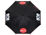 A black umbrella with a design featuring logos, shown from an overhead view.