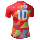 A red football jersey with vibrant abstract patterns and the number 10 on the back. It features a logo.