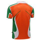 A rugby tee in orange and green with a sporty design. The back features a logo.