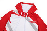 A red and white women's hoodie featuring a large hood, drawstrings, and a small logo.