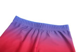 Tight shorts featuring a gradient design from purple to red, with an elastic waistband. The shorts have a smooth finish and branding.