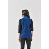 A blue women's vest with a high collar, featuring a fitted style, displayed from the back. It has a small logo.