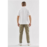 A white men's polo shirt is displayed from the back, paired with olive green cargo pants. The shirt has a logo.
