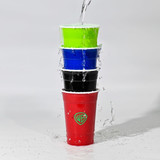 A stack of four double wall party cups in red, black, blue, and green with water pouring over them. Contains a logo.