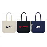 Three tote bags in various colours: a beige bag with a logo, a black bag with a logo, and a navy bag with a logo.
