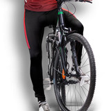 Custom men's cycling pants in black with red accents, featuring a branding logo, paired with a bicycle.