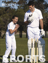 A cricket short sleeve polo in white, featuring a logo, worn by a man and a girl on a grassy field.