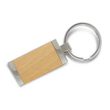 A wooden key ring with metal accents and a circular metal ring, featuring a natural wood finish.