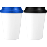 Two insulated tumblers, one with a blue lid and the other with a black lid, both featuring a white body and a logo.