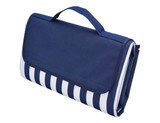 A navy picnic rug with white stripes, featuring a convenient carrying handle and a folded design.